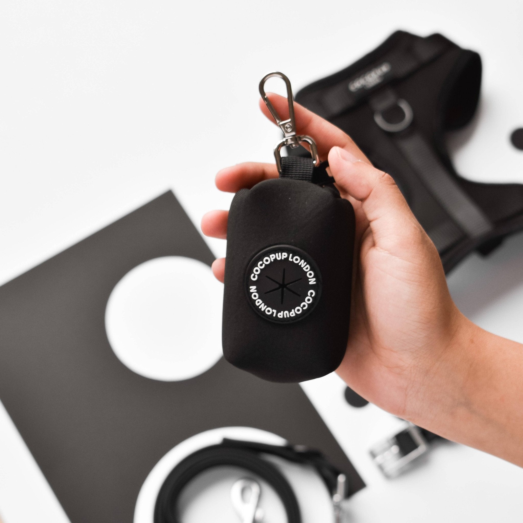 Cocopup London NAKD poop bag holder in liquorice black, leather waste bag dispenser for dogs